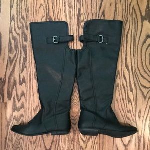 Black knee high boots.